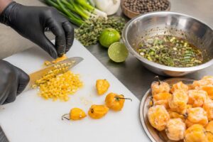 How Do You Use IQF Whole Yellow Scotch Bonnet Chillies in Jerk Sauces and Caribbean Ready Meals?